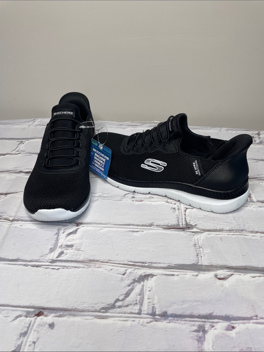 Skechers Black Knit Slip-On Sneakers with White Sole